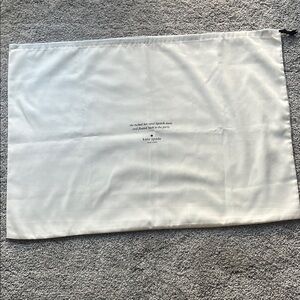 Kate Spade Cream Duster bag. Brand new. Very small mark in corner. 19x27